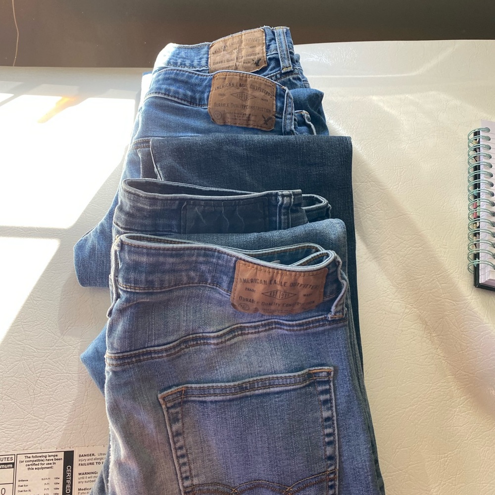 Size 30X34 AE  lot 4 pair one has rip near pocket and one has stain on pocket